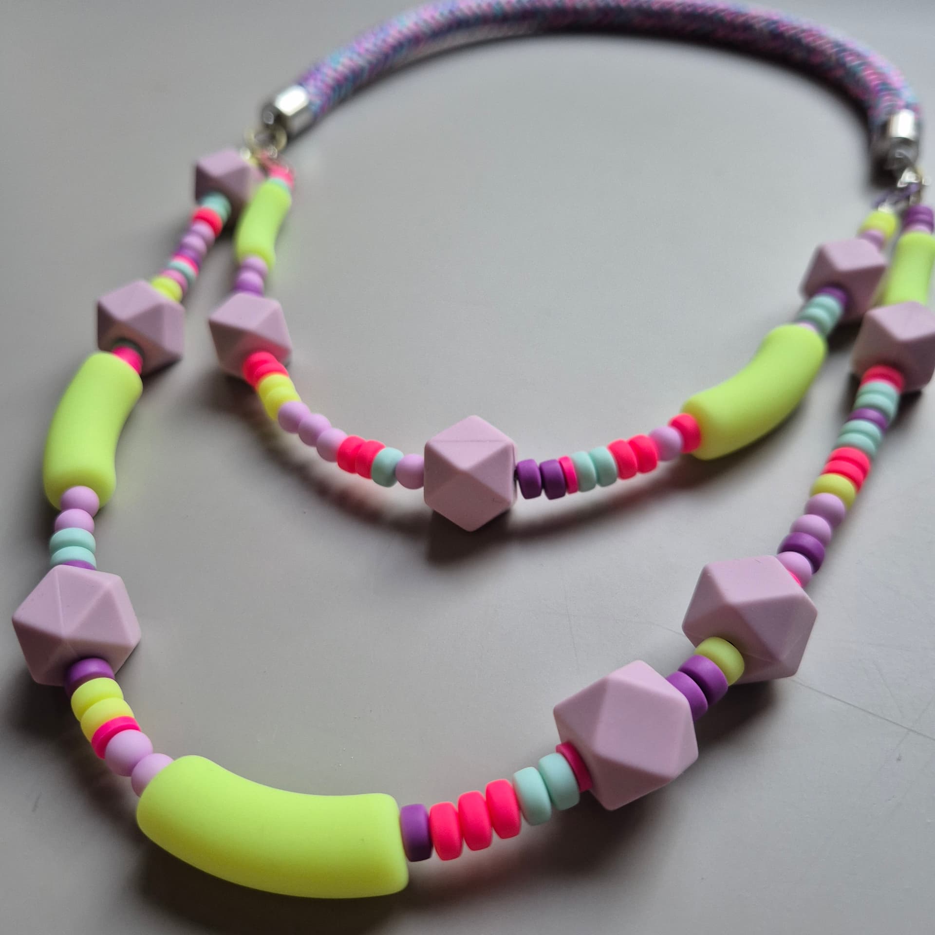 Double-strand pastel necklace with lilac faceted beads, neon yellow tubes and candy-coloured heishi discs